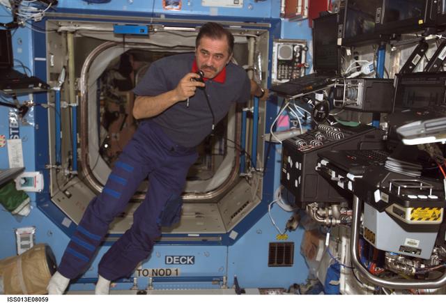 NASA image: Vinogradov uses communication equipment in the U.S. Laboratory during Expedition 13