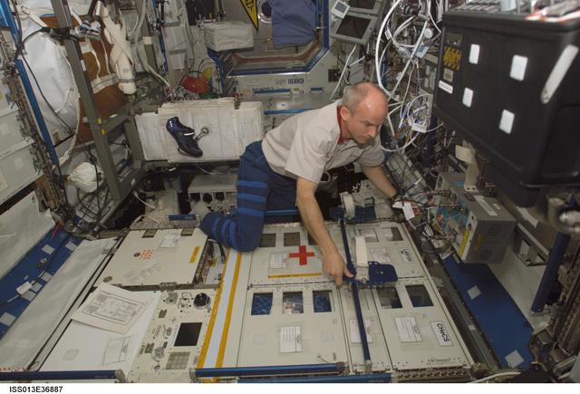 NASA image: Williams deactivates the CHeCS in the U.S. Laboratory during Expedition 13