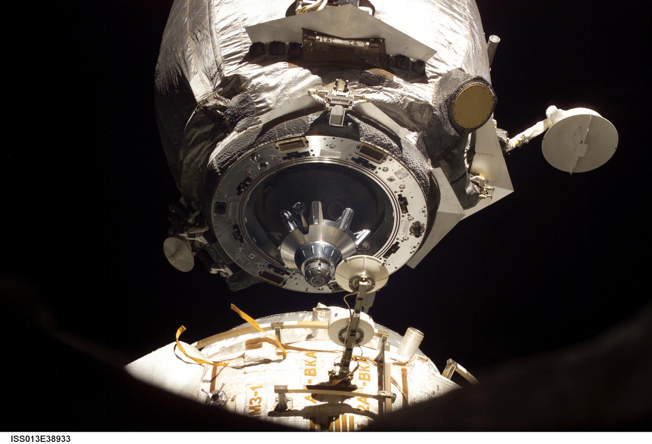 ISS013-E-38933 (19 June 2006) --- This close-up view of an unpiloted Progress supply vehicle was photographed by an Expedition 13 crewmember on the International Space Station as it departed from the Pirs Docking Compartment. The Progress 20 undocked June 19, 2006 and was later commanded to de-orbit with its load of trash and unneeded equipment and burn in Earth's atmosphere. The undocking clears the way for the arrival of a new Progress 22, planned to launch June 24 and dock with the station on June 26.
