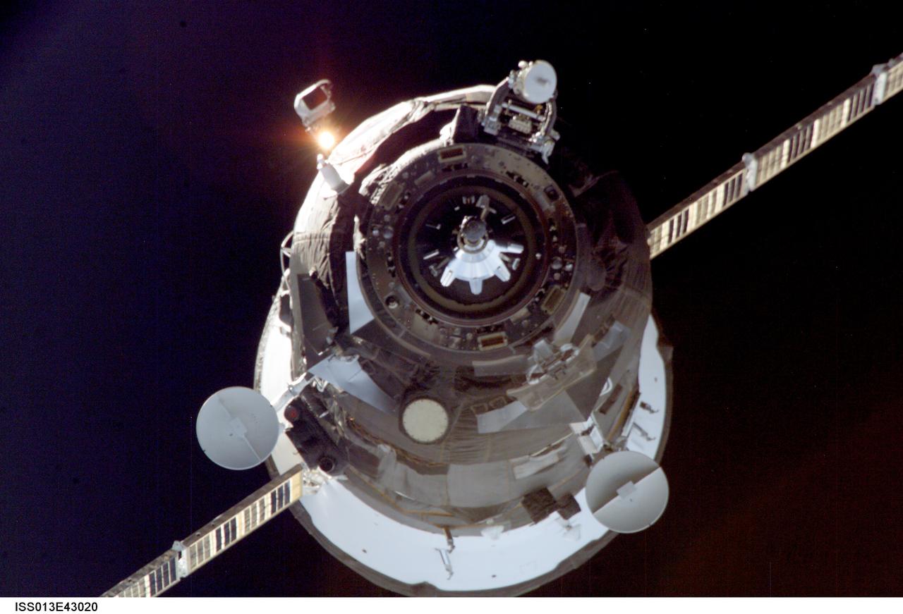 ISS013-E-43020 (26 June 2006) --- Backdropped by the blackness of space, an unpiloted Progress supply vehicle approaches the International Space Station. The Progress 22 resupply craft launched at 10:08 a.m. (CDT) on June 24, 2006 from the Baikonur Cosmodrome in Kazakhstan to deliver 2.5 tons of food, water, fuel, oxygen and other supplies to the Expedition 13 crewmembers onboard the station. Progress automatically docked to the Pirs Docking Compartment at 11:25 a.m. (CDT) on June 26 as the spacecraft and the station flew approximately 220 miles above a point near northern Africa.