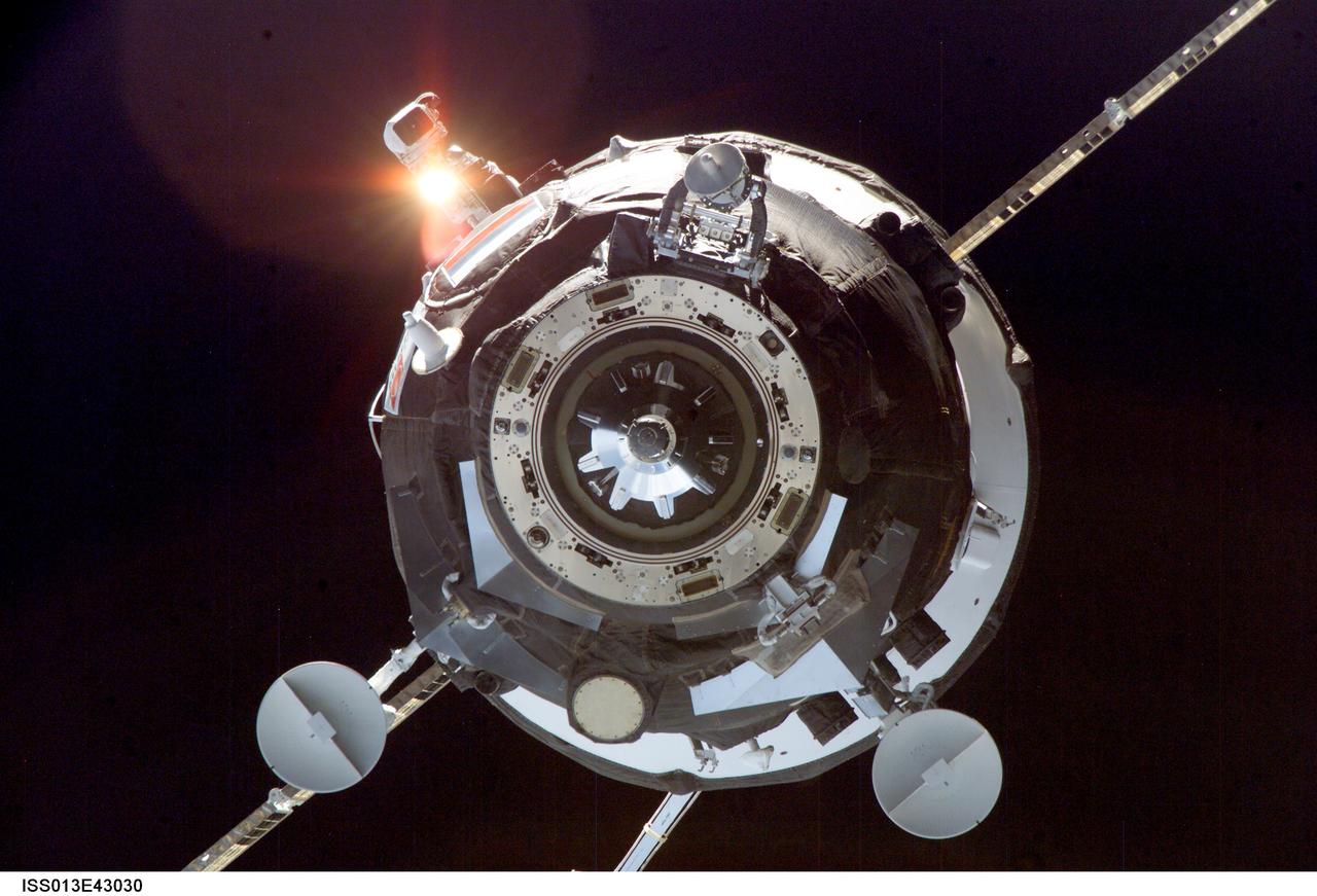 ISS013-E-43030 (26 June 2006) --- Backdropped by the blackness of space, an unpiloted Progress supply vehicle approaches the International Space Station. The Progress 22 resupply craft launched at 10:08 a.m. (CDT) on June 24, 2006 from the Baikonur Cosmodrome in Kazakhstan to deliver 2.5 tons of food, water, fuel, oxygen and other supplies to the Expedition 13 crewmembers onboard the station. Progress automatically docked to the Pirs Docking Compartment at 11:25 a.m. (CDT) on June 26 as the spacecraft and the station flew approximately 220 miles above a point near northern Africa.