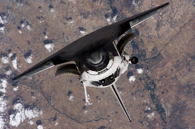NASA image: Discovery approaching the ISS for docking during the STS-121 mission