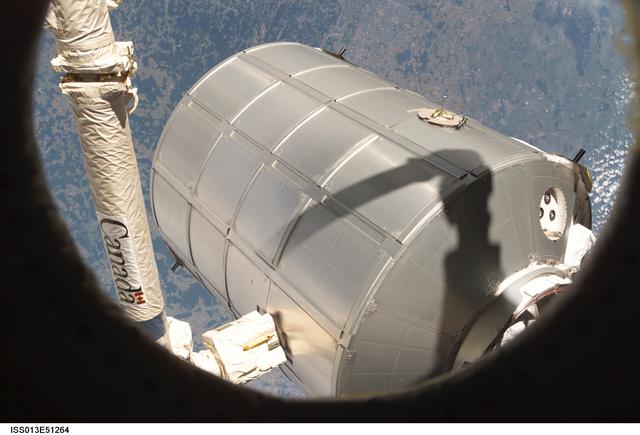 NASA image: Transfer of the MPLM Leonardo from the ISS to the Orbiter Discovery Payload Bay