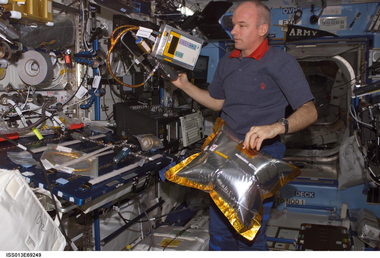 Williams works on DAFT during Expedition 13