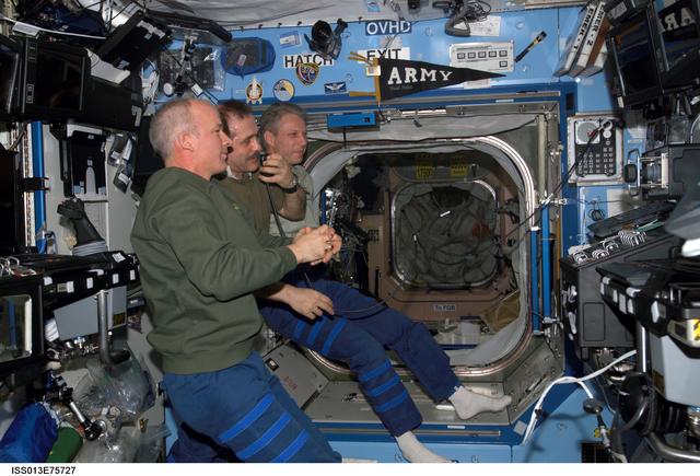 NASA image: Expedition 13 Crew during a teleconference in the U.S. Laboratory during Expedition 13