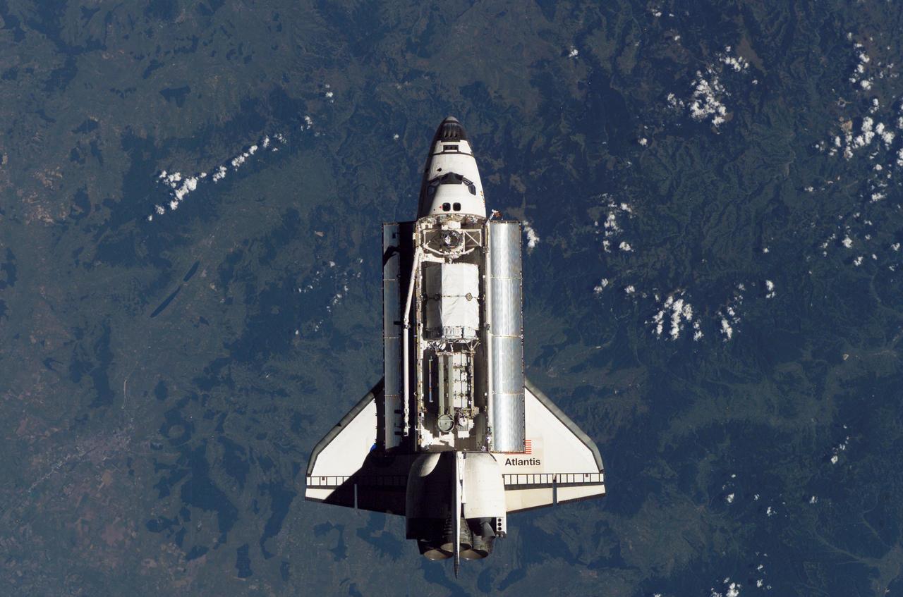 ISS013-E-80632 (11 Sept. 2006) --- This overhead image of the Space Shuttle Atlantis (STS-115), recorded by an Expedition 13 crewmember onboard the International Space Station, gives an excellent view of the hardware stowed in the cargo bay which will later be used to resume the construction of the orbital outpost.