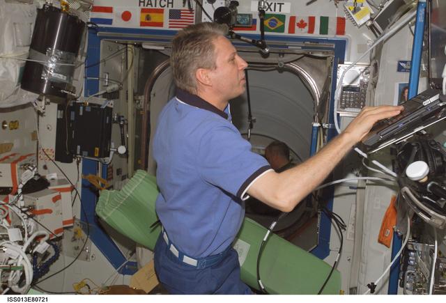 NASA image: Reiter and Williams during the STS/ISS Hatch Opening in the U.S. Laboratory