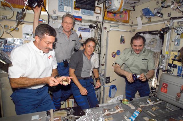 NASA image: Expedition 13 / STS-115 Crewmembers in the SM