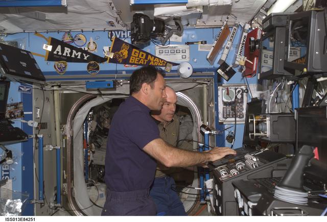 NASA image: Lopez-Alegria and Williams working in the U.S. Laboratory