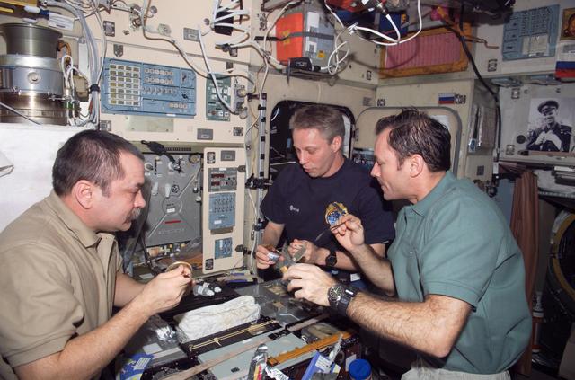 NASA image: Expedition 14 crew in galley area of Zvezda Service module
