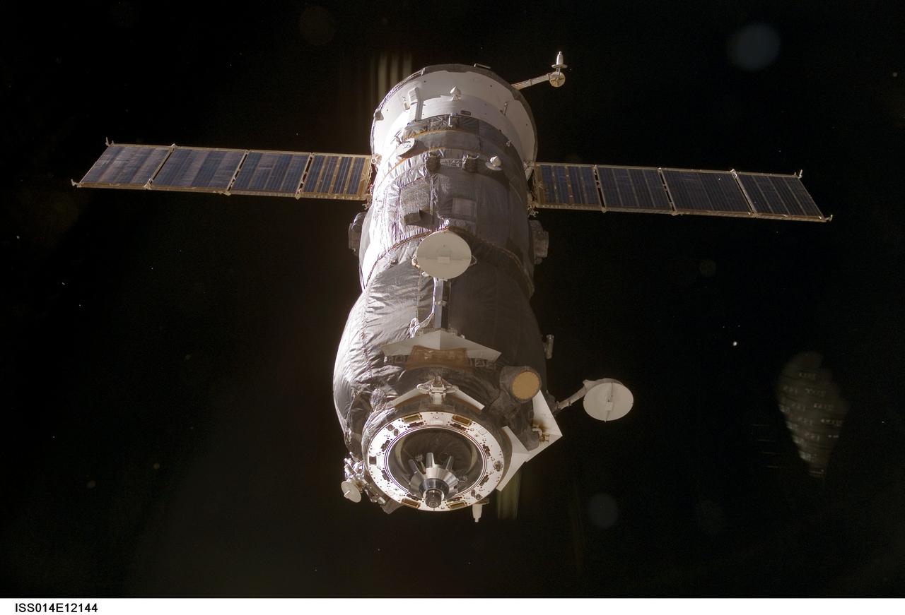 ISS014-E-12144 (16 Jan. 2007) --- Backdropped by the blackness of space, an unpiloted Progress 22 supply vehicle departs from the Pirs Docking Compartment of the International Space Station on Jan. 16, 2007, carrying its load of trash and unneeded equipment to be deorbited and burned up in Earth's atmosphere. The undocking clears the way for the arrival of a new Progress 24, planned to launch January 17 and dock with the station on January 19.