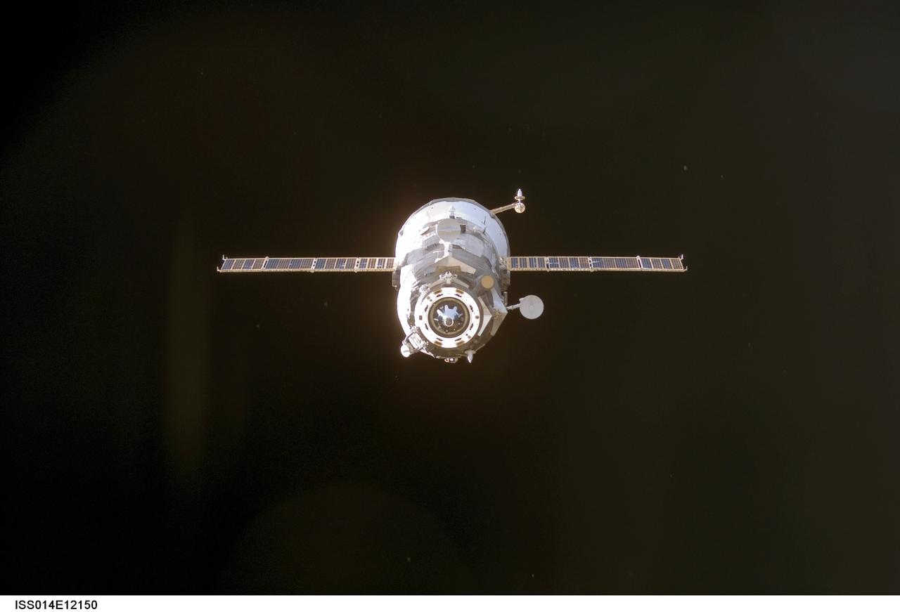 ISS014-E-12150 (16 Jan. 2007) --- Backdropped by the blackness of space, an unpiloted Progress 22 supply vehicle departs from the Pirs Docking Compartment of the International Space Station on Jan. 16, 2007, carrying its load of trash and unneeded equipment to be deorbited and burned up in Earth's atmosphere. The undocking clears the way for the arrival of a new Progress 24, planned to launch January 17 and dock with the station on January 19.