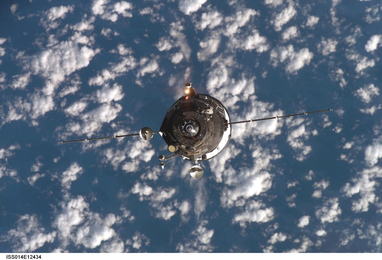 ISS014-E-12434 (19 Jan. 2007) --- Backdropped by a blue and white Earth, an unpiloted Progress supply vehicle approaches the International Space Station. The Progress 24 resupply craft launched at 8:12 p.m. (CST) on Jan. 17, 2007 from the Baikonur Cosmodrome in Kazakhstan to deliver 2.5 tons of food, fuel, oxygen and other supplies to the Expedition 14 crewmembers onboard the station. Progress automatically docked to the Pirs Docking Compartment at 8:59 p.m. (CST) on Jan. 19 as the spacecraft and the station flew approximately 220 miles above a point near the South Atlantic off the southeast coast of Uruguay.