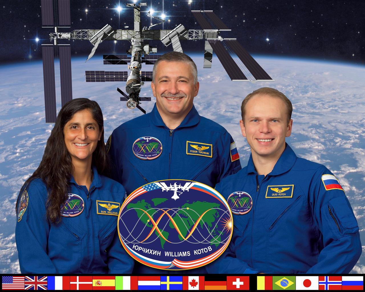 ISS015-S-002A (21 Sept. 2006) --- Cosmonaut Fyodor N. Yurchikhin (center), Expedition 15 commander representing Russia's Federal Space Agency; cosmonaut Oleg V. Kotov (right), flight engineer representing Russia's Federal Space Agency; and astronaut Sunita L. Williams, flight engineer, take a break from training at Johnson Space Center to pose for a crew portrait. Williams will join Expedition 14 in progress after traveling to the International Space Station on shuttle mission STS-116 in December 2006 and will become an Expedition 15 flight engineer on April 19, 2007, after Yurchikhin and Kotov dock to the station.