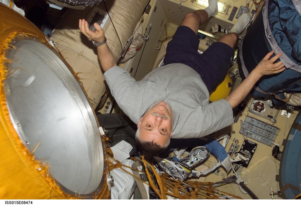 Yurchikhin poses for a photo in the DC1 during Expedition 15