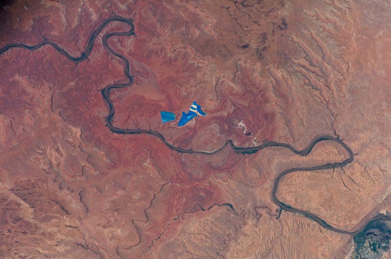 ISS015-E-08879 (18 May 2007) --- An evaporation pond near the Colorado River in Utah is featured in this image photographed by an Expedition 15 crewmember on the International Space Station.
