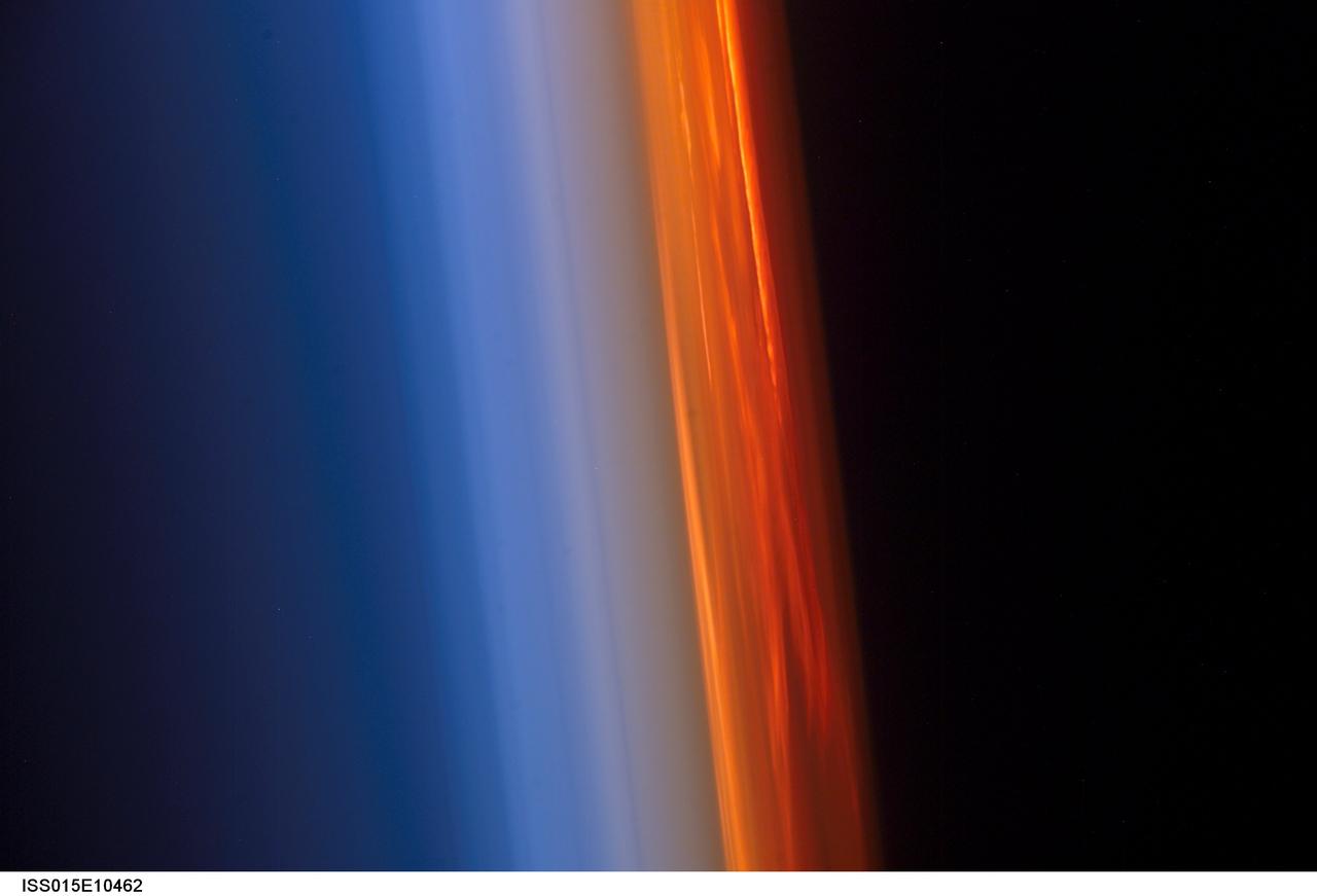 ISS015-E-10462 (3 June 2007) --- The profile of the atmosphere and a setting sun are featured in this image photographed by an Expedition 15 crewmember on the International Space Station.