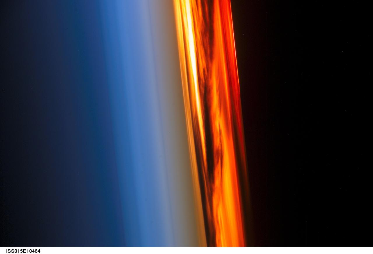 ISS015-E-10464 (3 June 2007) --- The profile of the atmosphere and a setting sun are featured in this image photographed by an Expedition 15 crewmember on the International Space Station.