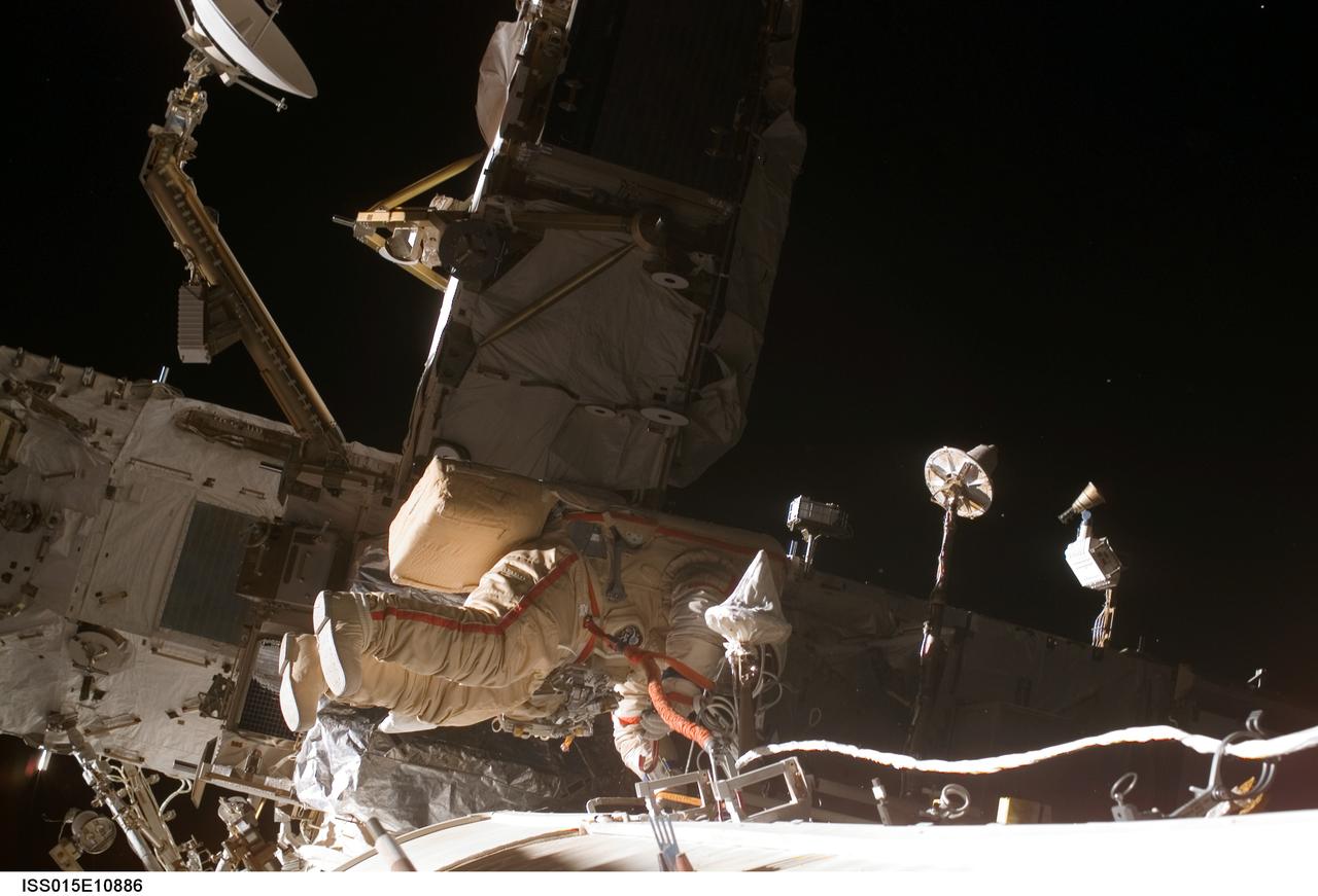 ISS015-E-10886 (6 June 2007) --- Cosmonaut Fyodor N. Yurchikhin, Expedition 15 commander representing Russia's Federal Space Agency, wearing a Russian Orlan spacesuit, participates in a session of extravehicular activity (EVA). Among other tasks, Yurchikhin and cosmonaut Oleg V. Kotov (out of frame), flight engineer representing Russia's Federal Space Agency, completed the installation of 12 more Zvezda Service Module debris panels and installed sample containers on the Pirs Docking Compartment for a Russian experiment, called Biorisk, which looks at the effect of space on microorganisms.