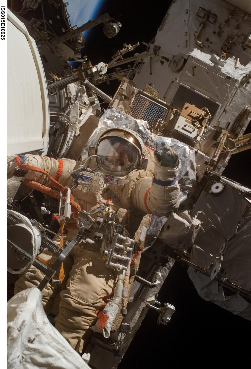 ISS015-E-10925 (6 June 2007) --- Cosmonaut Fyodor N. Yurchikhin, Expedition 15 commander representing Russia's Federal Space Agency, wearing a Russian Orlan spacesuit, participates in a session of extravehicular activity (EVA). Among other tasks, Yurchikhin and cosmonaut Oleg V. Kotov (out of frame), flight engineer representing Russia's Federal Space Agency, completed the installation of 12 more Zvezda Service Module debris panels and installed sample containers on the Pirs Docking Compartment for a Russian experiment, called Biorisk, which looks at the effect of space on microorganisms.