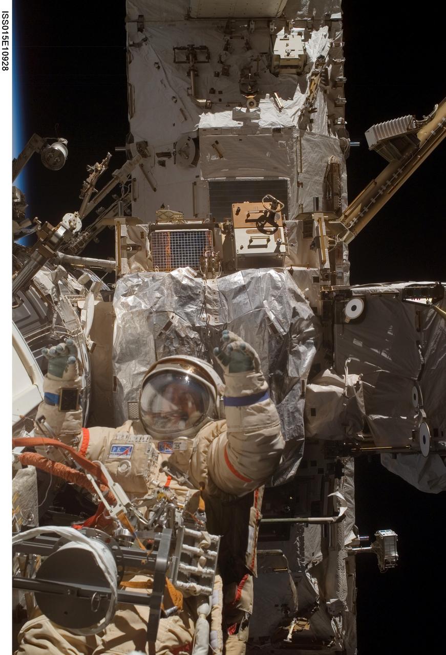 ISS015-E-10928 (6 June 2007) --- Cosmonaut Fyodor N. Yurchikhin, Expedition 15 commander representing Russia's Federal Space Agency, wearing a Russian Orlan spacesuit, participates in a session of extravehicular activity (EVA). Among other tasks, Yurchikhin and cosmonaut Oleg V. Kotov (out of frame), flight engineer representing Russia's Federal Space Agency, completed the installation of 12 more Zvezda Service Module debris panels and installed sample containers on the Pirs Docking Compartment for a Russian experiment, called Biorisk, which looks at the effect of space on microorganisms.