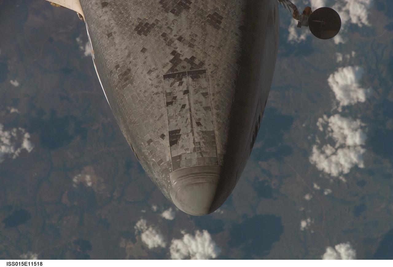 ISS015-E-11518 (10 June 2007) --- This view of the nose of Space Shuttle Atlantis and part of the forward underside was provided by an Expedition 15 crewmember during a back-flip for the RPM survey by the approaching STS-117 crew to the International Space Station. Distance from the station and shuttle at this time was approximately 600 feet.