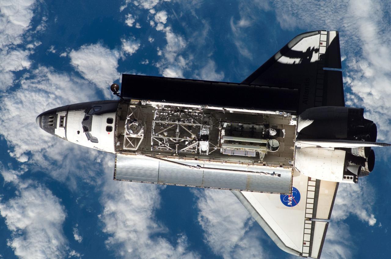 ISS015-E-11705 (10 June 2007) --- A nadir view of the Space Shuttle Atlantis was photographed by a member of the Expedition 15 crew aboard the International Space Station as the two spacecraft were nearing their much-anticipated link-up in Earth orbit. The 17.8 ton S3/S4 truss to be added next week to the station can be seen berthed in the payload bay of the shuttle.