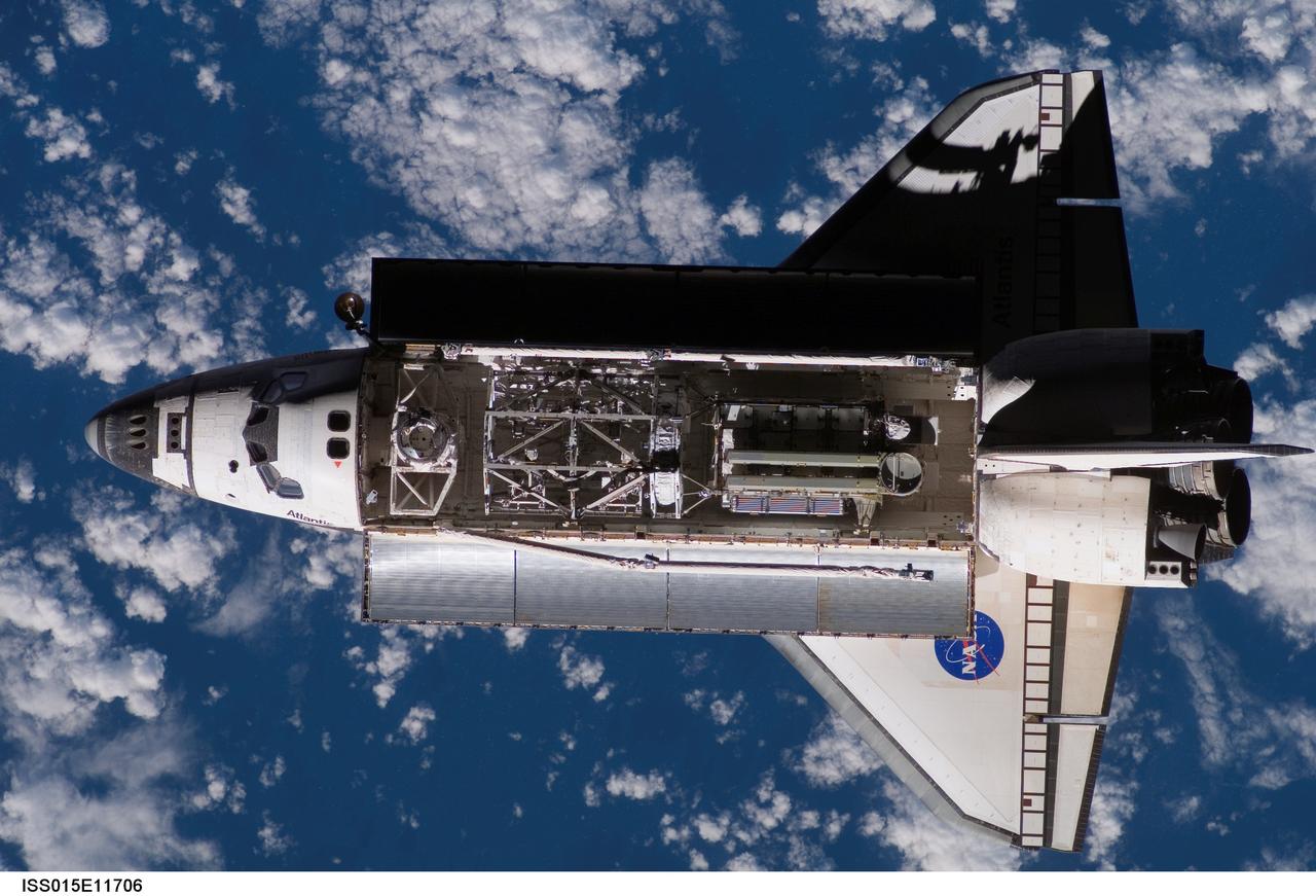 ISS015-E-11706 (10 June 2007)  --- A nadir view of the Space Shuttle Atlantis was photographed by a member of the Expedition 15 crew aboard the International Space Station as the two spacecraft were nearing their much-anticipated link-up in Earth orbit.  The 17.8 ton S3/S4 truss to be added next week to the station can be seen berthed in the payload bay of the shuttle.