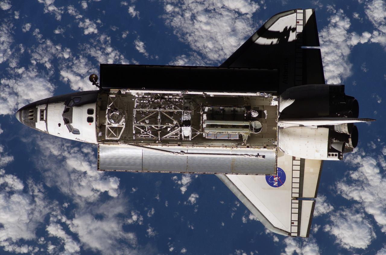 ISS015-E-11707 (10 June 2007) --- A nadir view of the Space Shuttle Atlantis was photographed by a member of the Expedition 15 crew aboard the International Space Station as the two spacecraft were nearing their much-anticipated link-up in Earth orbit. The 17.8 ton S3/S4 truss to be added next week to the station can be seen berthed in the payload bay of the shuttle.