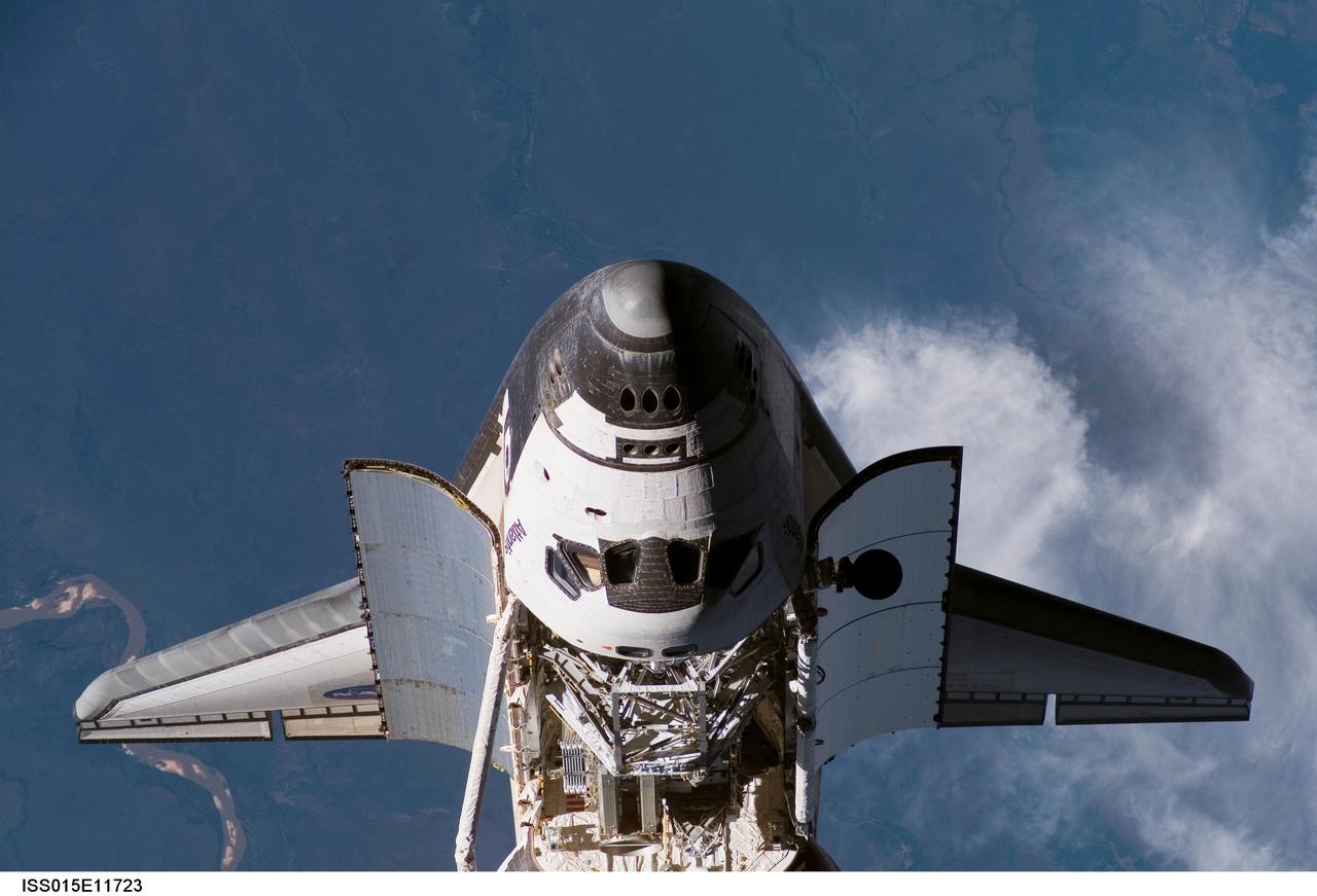 Atlantis and Payload on approach to the ISS during the STS-117 Mission