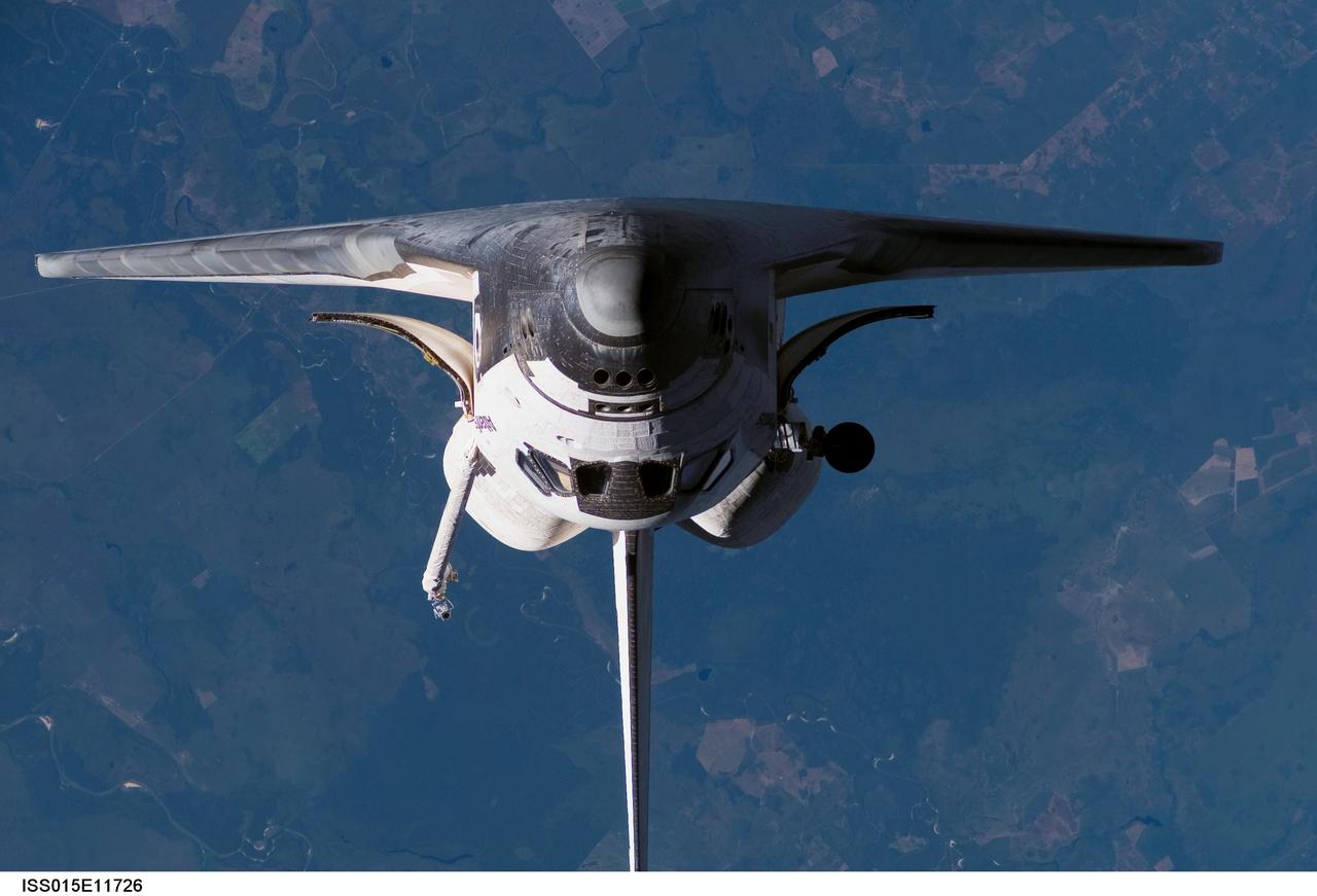Atlantis and Payload on approach to the ISS during the STS-117 Mission