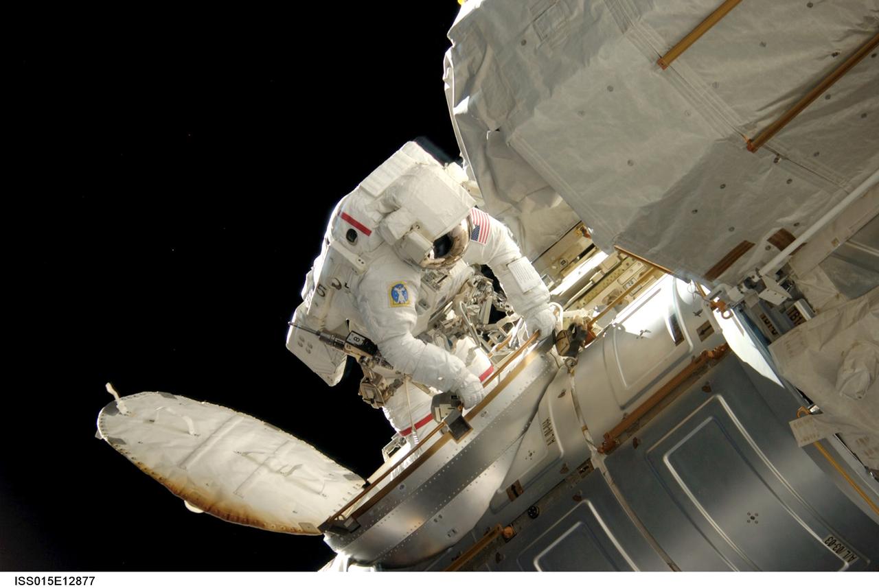ISS015-E-12877 (15 June 2007) --- Astronaut Jim Reilly, STS-117 mission specialist, enters the Quest Airlock on the International Space Station at the conclusion of the mission's third scheduled session of extravehicular activity (EVA) while Space Shuttle Atlantis was docked with the station.