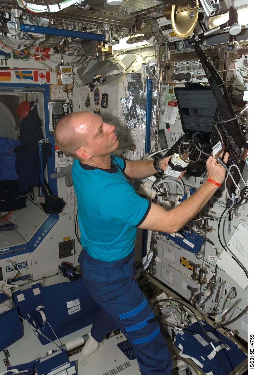 ISS015-E-14759 (30 June 2007) --- Astronaut Clayton C. Anderson, Expedition 15 flight engineer, uses computers in the Destiny laboratory of the International Space Station.