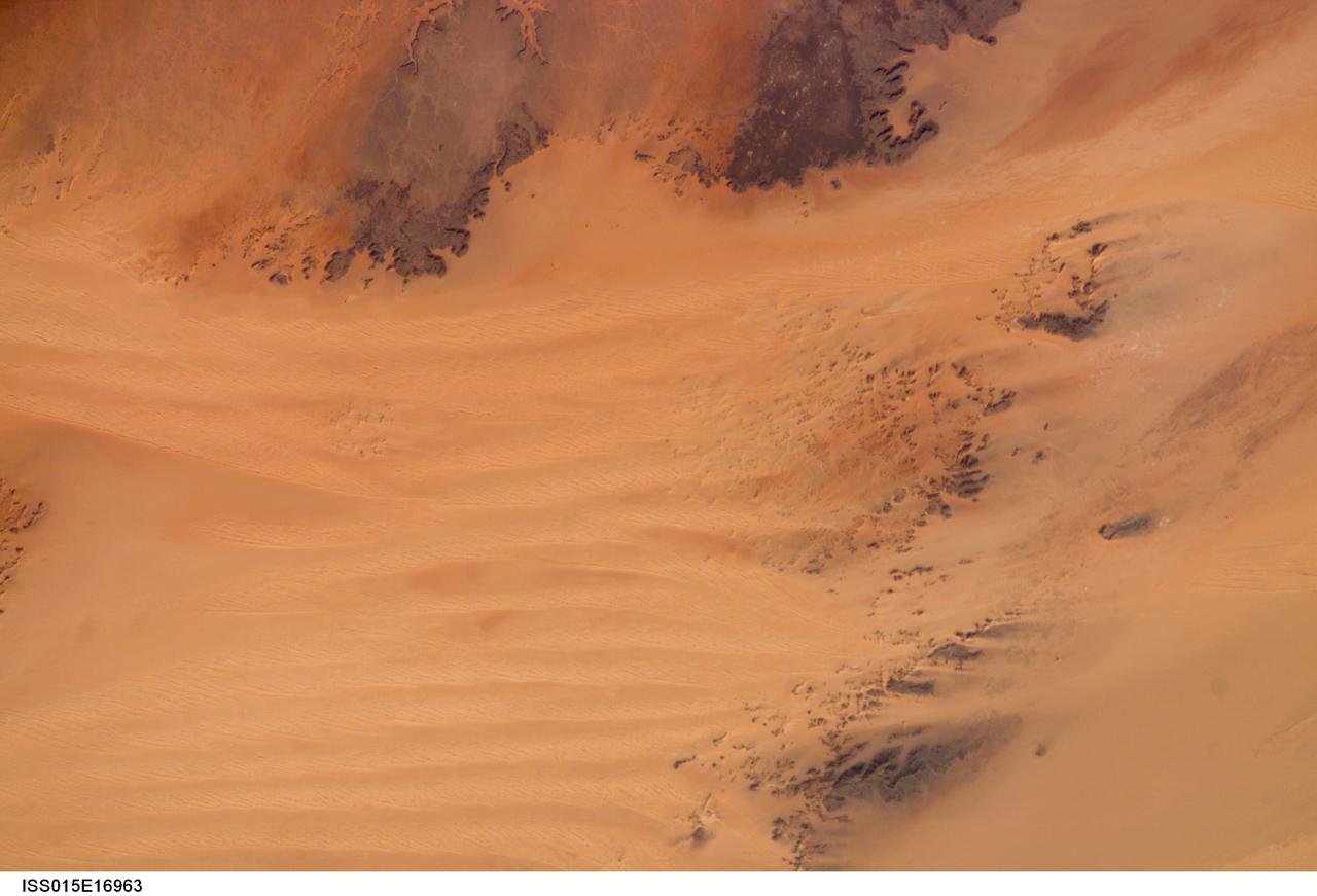ISS015-E-16963 (7 July 2007) --- Sahara Desert dunes are featured in this image photographed by an Expedition 15 crewmember on the International Space Station.