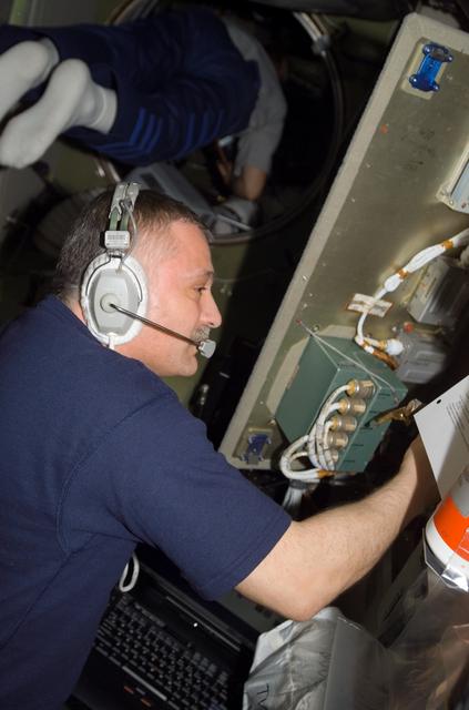 NASA image: View of Yurchikhin working on SMCC2 Command Processing Unit during Expedition 15
