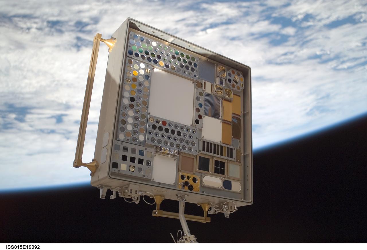 iss015e19092 (7/23/2007) --- View of Materials International Space Station Experiment (MISSE) Passive Experiment Container (PEC) mounted to the exterior of the Quest/Airlock (A/L). Photo taken during a session of Extravehicular Activity (EVA) on Expedition 15. Materials on the International Space Station Experiment 3 and 4 (MISSE - 3 and 4) are the third and fourth in a series of five suitcase-sized test beds attached to the outside of the space station. The beds were deployed during a spacewalk by the station crew in August 2006. They are exposing hundreds of potential space construction materials and different types of solar cells to the harsh environment of space. Mounted to the space station for about a year, the equipment then will be returned to Earth for study. Investigators will use the resulting data to design stronger, more durable spacecraft.