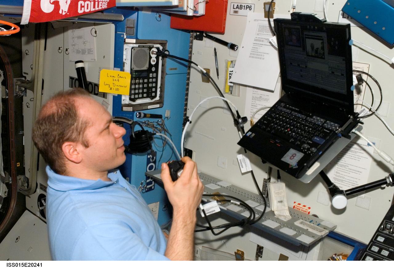 ISS015-E-20241 (29 July 2007) --- Cosmonaut Oleg V. Kotov, Expedition 15 flight engineer representing Russia's Federal Space Agency, uses a communication system in the Destiny laboratory of the International Space Station.