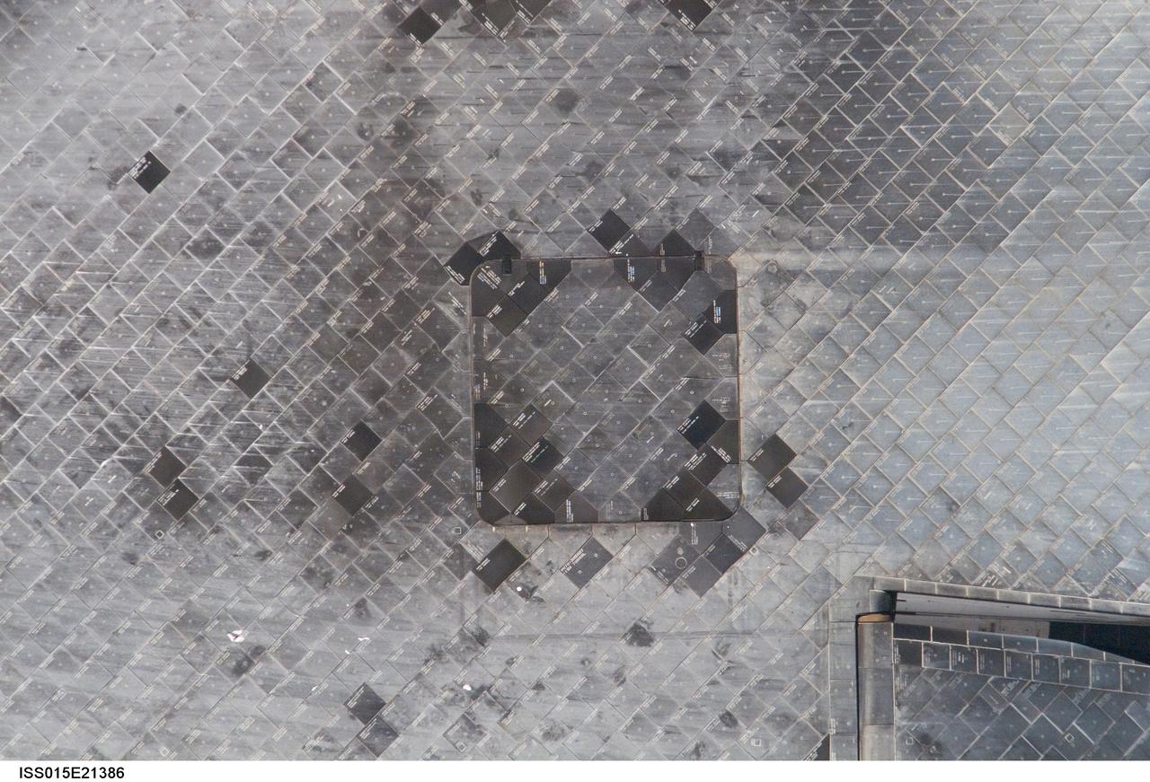 ISS015-E-21386 (10 Aug. 2007) --- This photo of the underside of the Space Shuttle Endeavour was taken from the International Space Station during a back flip and careful survey by crewmembers onboard the orbital outpost. After ground studies, mission managers suspect debris came off Endeavour's external fuel tank one minute after liftoff on Wednesday and struck tiles on the shuttle's underside, near the right main landing gear door.