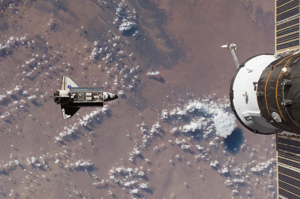 Endeavour and Payload on approach to the ISS during the STS-118 Mission