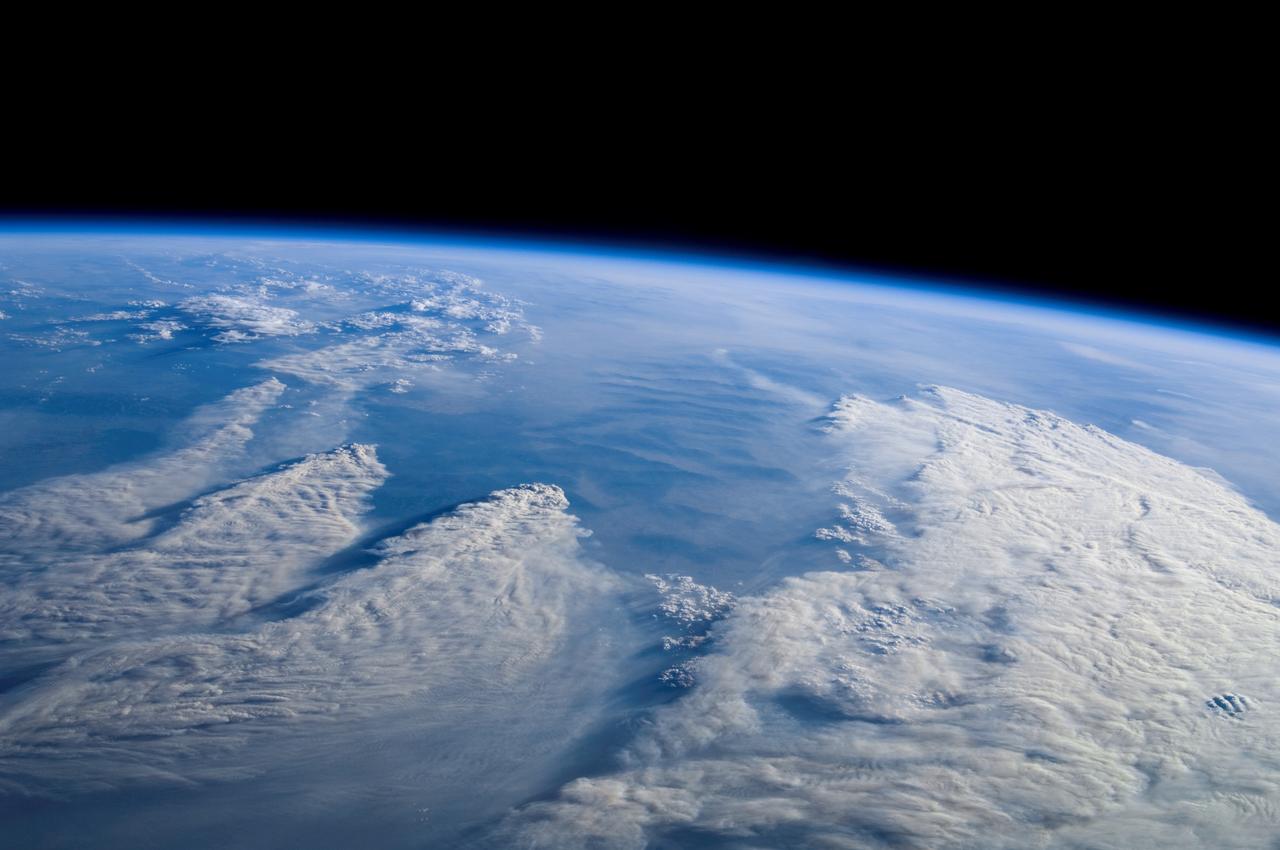 ISS015-E-22276 (13 Aug. 2007) --- Smoke plumes from wide-spread fires across Idaho, Utah and Montana are featured in this image photographed by an Expedition 15 crewmember on the International Space Station while Space Shuttle Endeavour (STS-118) was docked with the station. Looking westward toward the horizon, this image covers an expanse from northern Utah to central Idaho with southwest Montana in the foreground.