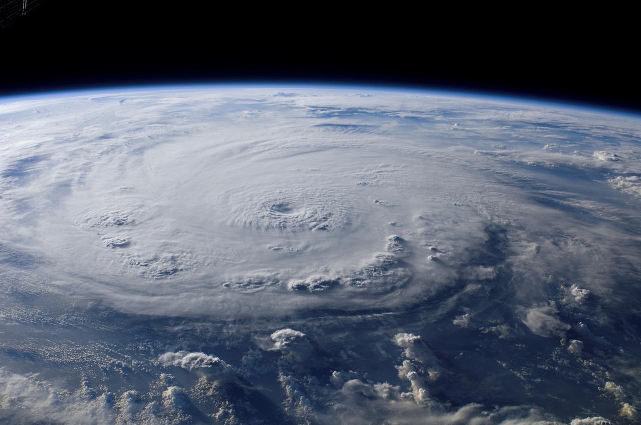 ISS015-E-25049 (3 Sept. 2007) --- This view of Hurricane Felix was taken from the Earth-orbiting International Space Station (ISS) by an Expedition 15 crewmember using a digital still camera equipped with a 28-70 mm lens set at 28 mm focal length on Sept. 3, 2007 at 11:38:46 GMT. The ISS was located at the nadir point of 16.9 degrees north latitude and 83.3 degrees west longitude, over the waters southwest of Grand Cayman Island. At approximately noon GMT, Hurricane Felix was near 14.2 degrees north latitude and 76.9 west longitude, about 260 miles (425 kilometers) south of Kingston Jamaica, and 425 miles (685 kilometers) east of Cabo Gracias a Dios on the Nicaragua/Honduras border, moving west at 21 miles per hour (33 kilometers per hour).  The sustained winds were 165 miles per hour with higher gusts making it a category 5 on the Saffir-Simpson scale.