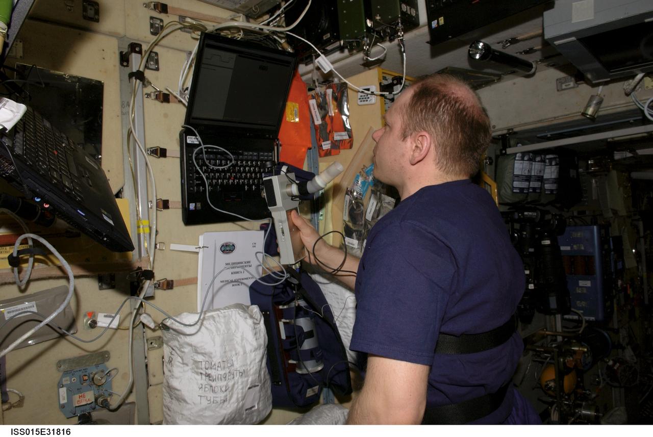 ISS015-E-31816 (4 Oct. 2007) --- Cosmonaut Oleg V. Kotov, Expedition 15 flight engineer representing Russia's Federal Space Agency, uses a computer while working on a respiration experiment in the Zvezda Service Module of the International Space Station.