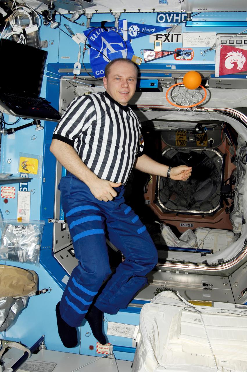 ISS015-E-32311 (October 2007) --- Cosmonaut Oleg V. Kotov, Expedition 15 flight engineer representing Russia's Federal Space Agency, poses for a photo in the Destiny laboratory of the International Space Station.