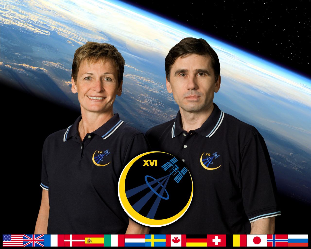 ISS016-S-002A (June 2007) ---This crew portrait shows astronaut Peggy Whitson, Expedition 16 commander, with Russia's Federal Space Agency cosmonaut Yuri Malenchenko, flight engineer and Soyuz commander. The two veterans of previous International Space Station flights are scheduled to launch to the complex in the Soyuz TMA-11 spacecraft from the Baikonur Cosmodrome in Kazakhstan in October for a six-month mission.