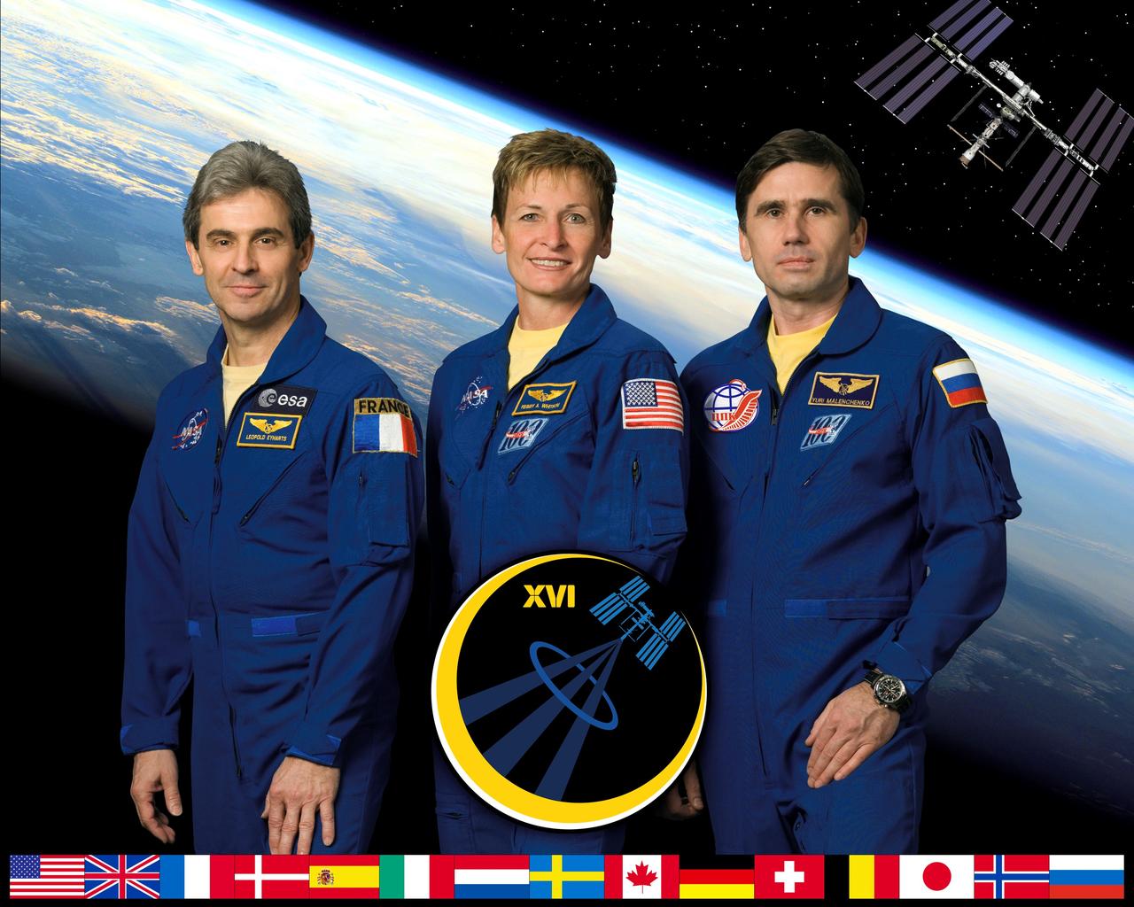 ISS016-S-002D (June 2007) --- This crew portrait shows astronaut Peggy Whitson, Expedition 16 commander; with Russia's Federal Space Agency cosmonaut Yuri Malenchenko (right), flight engineer and Soyuz commander, and the European Space Agency's Leopold Eyharts, flight engineer. Eyharts will arrive on the station in December to replace Dan Tani of NASA, who arrives in October. Whitson and Malenchenko, two veterans of previous International Space Station flights, are scheduled to launch to the complex in the Soyuz TMA-11 spacecraft from the Baikonur Cosmodrome in Kazakhstan in October for a six-month mission.