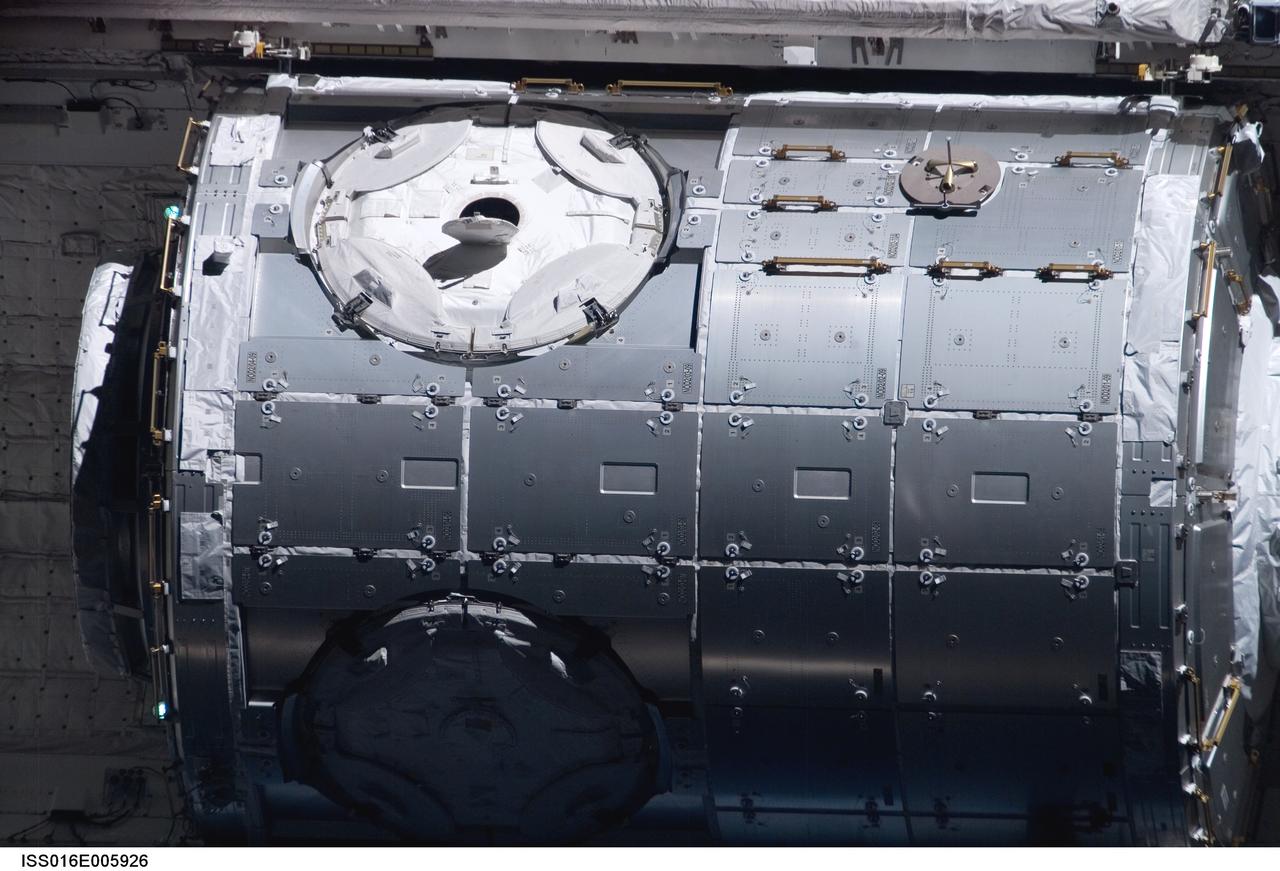 ISS016-E-005926 (25 Oct. 2007) --- A close-up view of the Harmony node in the payload bay of Space Shuttle Discovery is provided by this image photographed by an Expedition 16 crewmember during a backflip maneuver performed by the approaching visitors (STS-120) to the International Space Station.