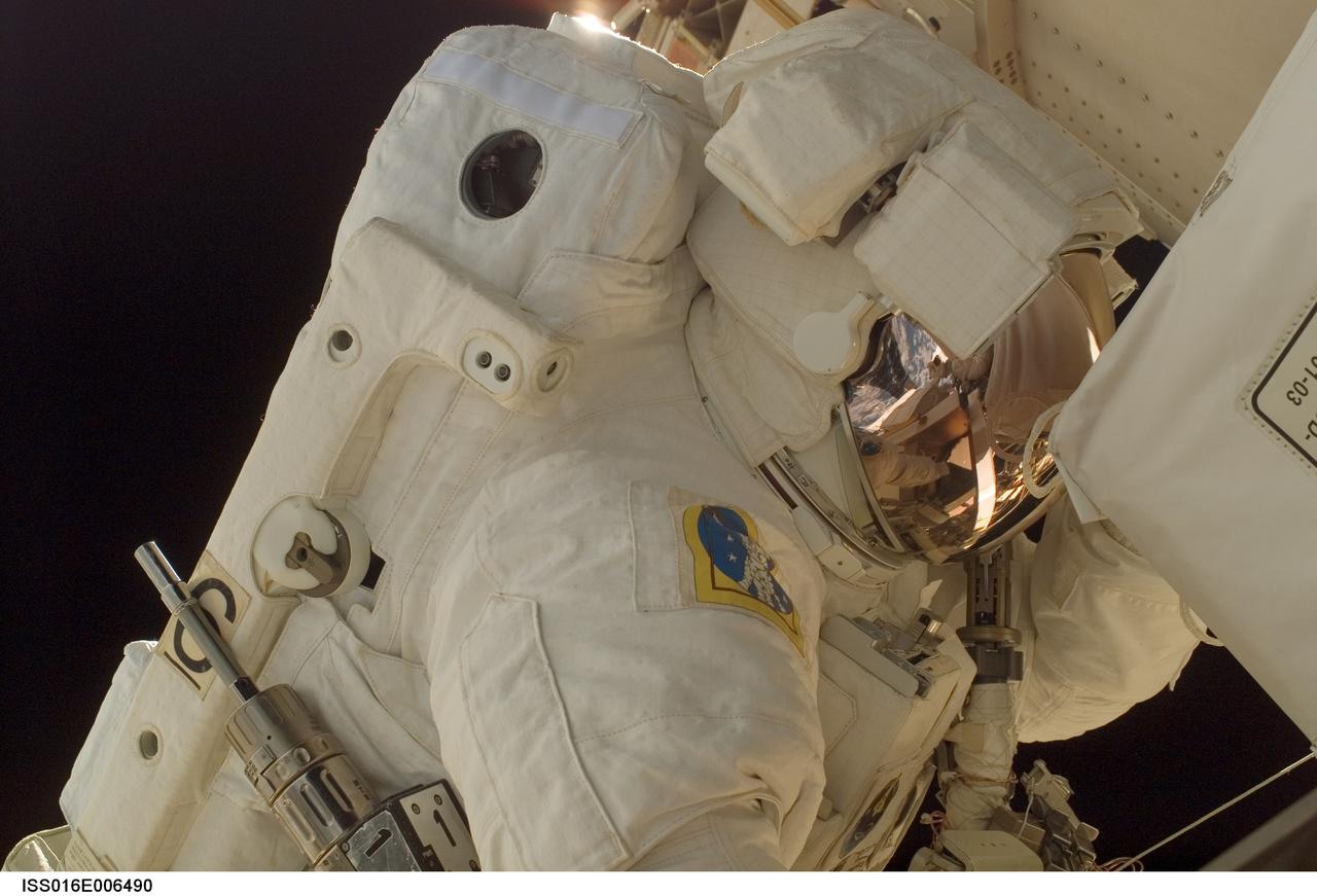 ISS016-E-006490 (26 Oct. 2007) --- Astronaut Doug Wheelock, STS-120 mission specialist, participates in the first of five scheduled sessions of extravehicular activity (EVA) to perform work on the International Space Station while Space Shuttle Discovery is docked to the station. In just over six hours, Wheelock and astronaut Scott Parazynski (out of frame), mission specialist, installed the Harmony module in its temporary location on the station, readied the P6 truss for its relocation during the second EVA session, retrieved a failed radio communications antenna and snapped shut a window cover on Harmony that opened during launch on Discovery.