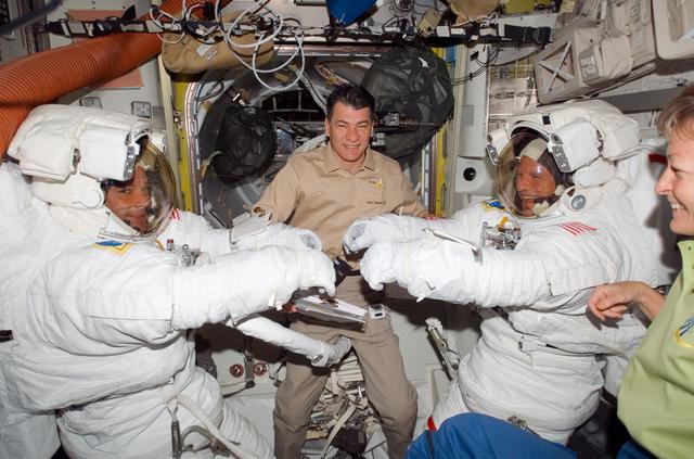 NASA image: Wheelock, Nespoli, Parazynski and Whitson in the A/L prior to EVA 1