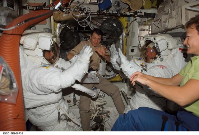 NASA image: Wheelock, Nespoli, Parazynski and Whitson in the A/L prior to EVA 1