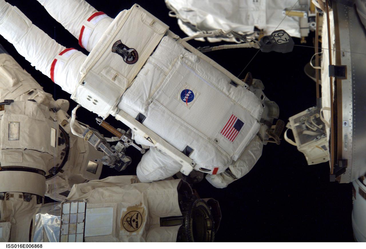 ISS016-E-006868 (26 Oct. 2007) --- Astronaut Scott Parazynski, STS-120 mission specialist, participates in the first of five scheduled sessions of extravehicular activity (EVA) to perform work on the International Space Station while Space Shuttle Discovery is docked to the station. In just over six hours, Parazynski and astronaut Doug Wheelock (out of frame), mission specialist, installed the Harmony module in its temporary location on the station, readied the P6 truss for its relocation during the second EVA session, retrieved a failed radio communications antenna and snapped shut a window cover on Harmony that opened during launch on Discovery.